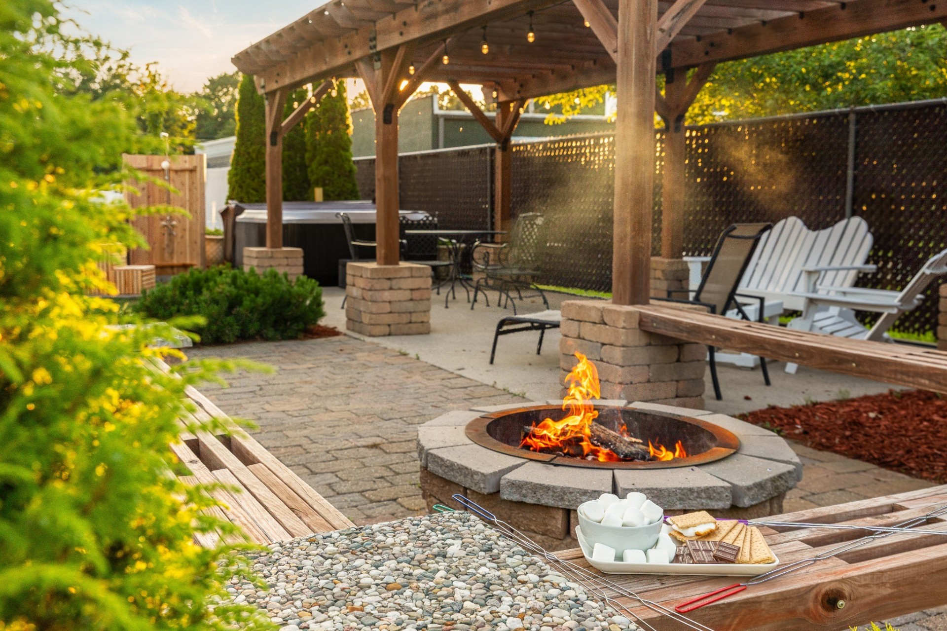 Guests gathering around the fire pit